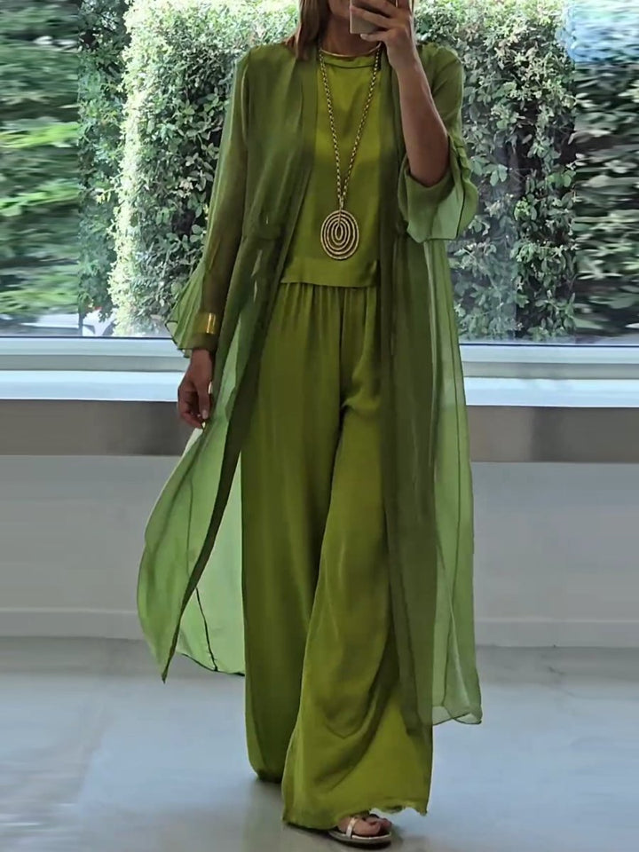 Plus size women's comfortable three-piece lounge set in green. Includes cardigan, tank top & wide-leg pants for relaxed wear.