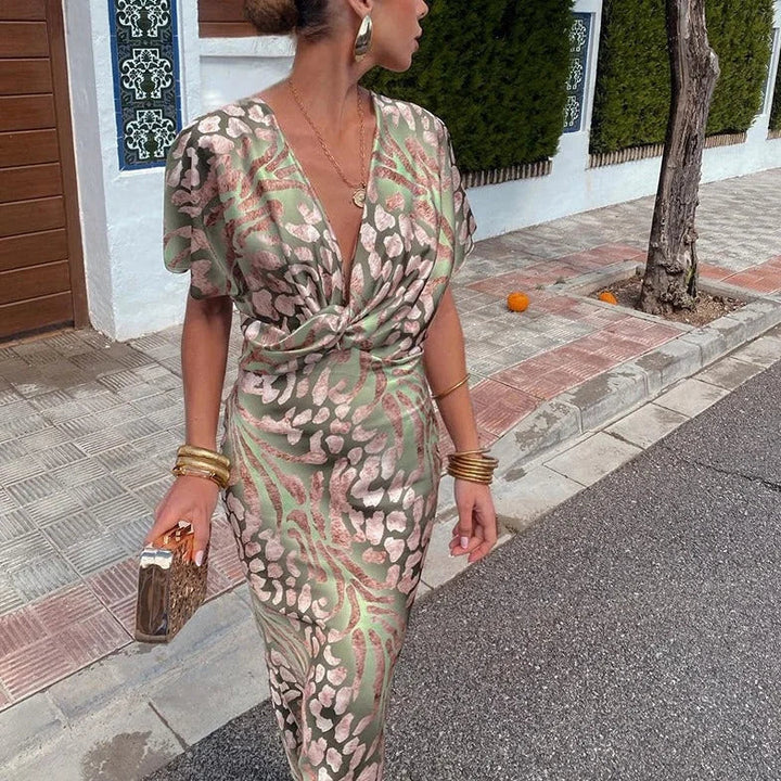 Comfortable green V-neck animal print maxi dress for women with short sleeves, ideal for stylish summer fashion.