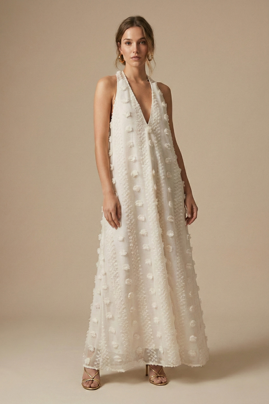 Elegant women's halter backless maxi dress with delicate floral appliqué, perfect for summer parties & special occasions.