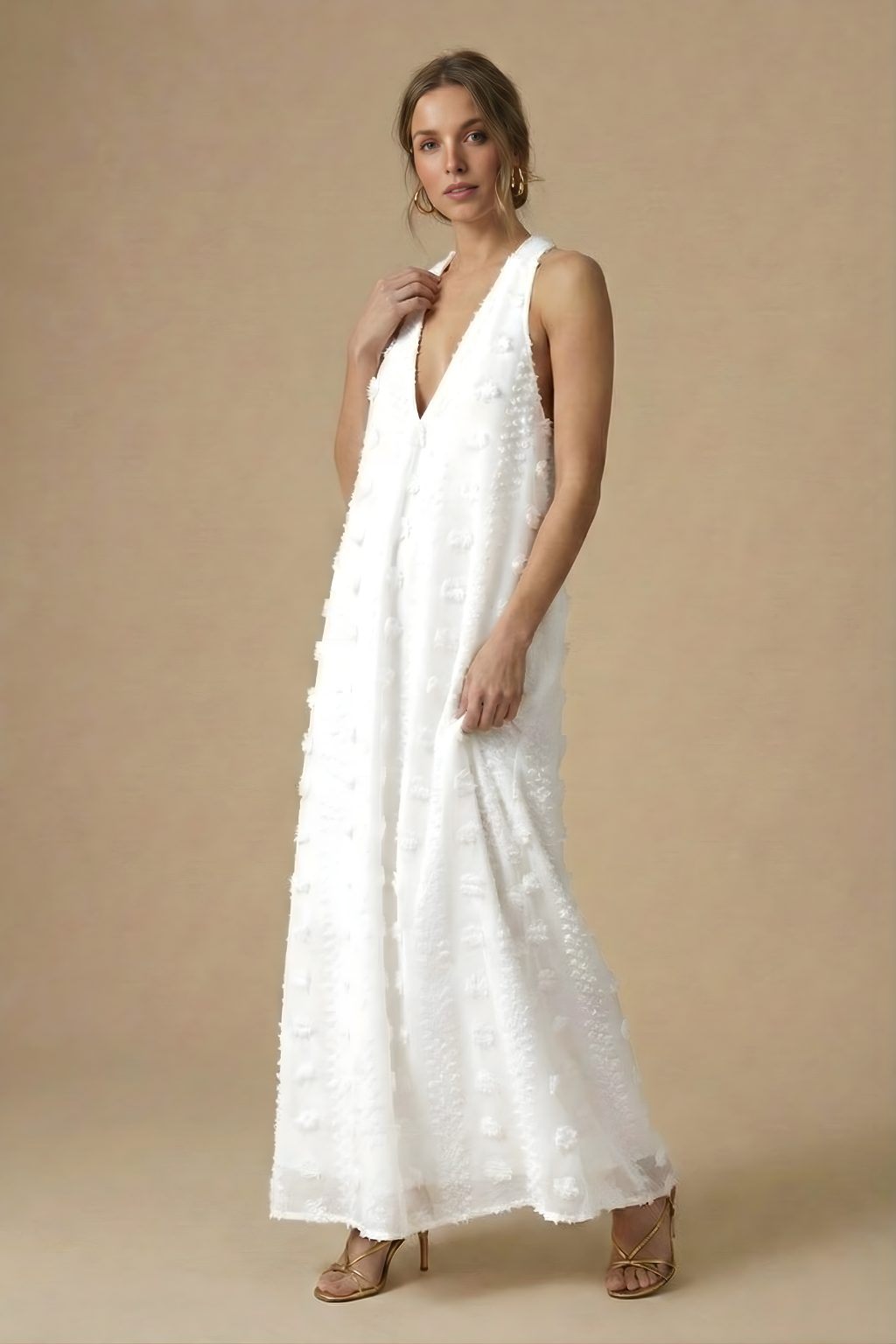 Stylish women's summer maxi dress: halter neck, backless, & vibrant floral appliqué, perfect for resort & evening wear.