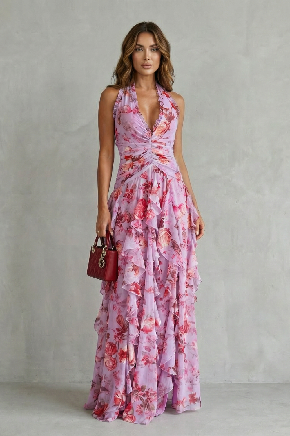 Romantic pink floral halter maxi dress, sleeveless & elegant. Ideal for evening wear events.