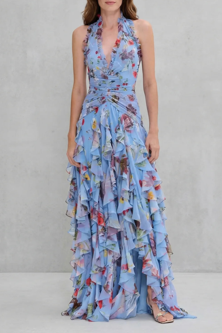 Women's elegant floral halter maxi dress, sleeveless & flowing. Comfortable special occasion wear.
