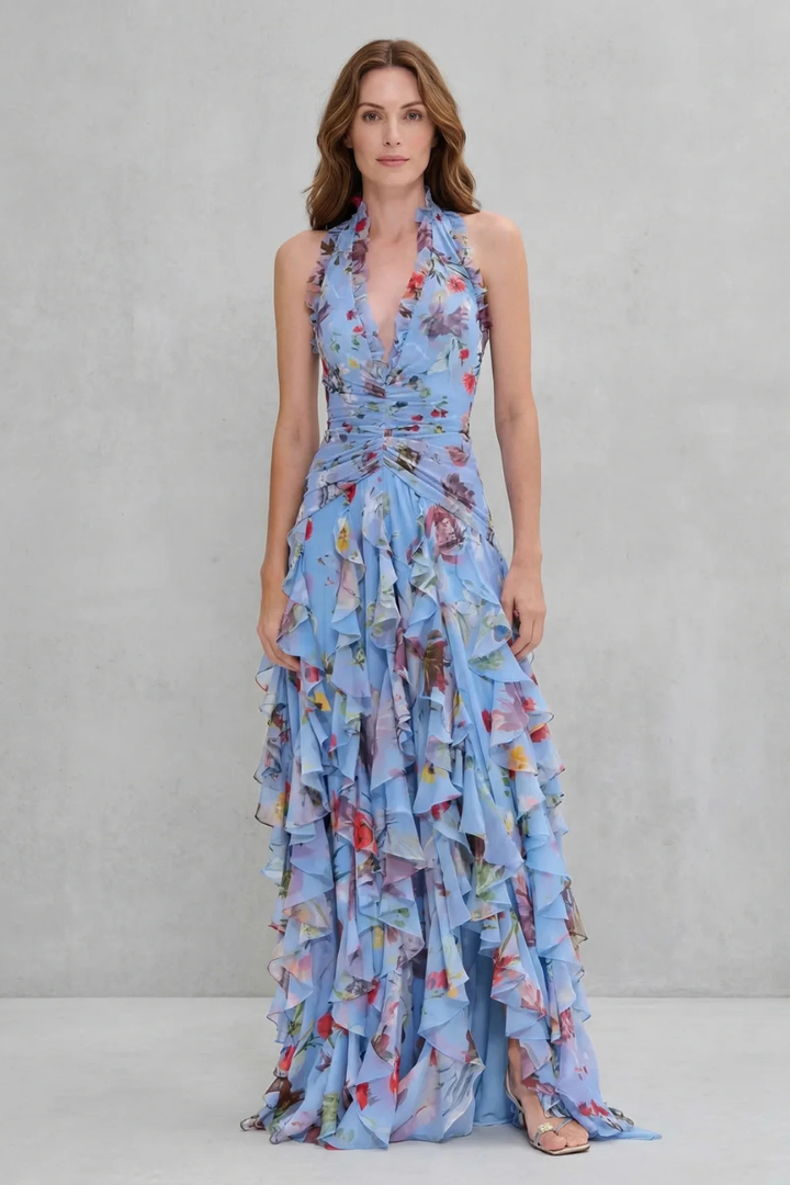Sleeveless halter maxi dress, flowing design. Elegant women's evening wear, available in pink/blue.
