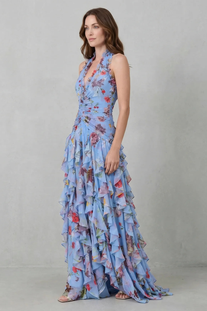 Romantic women's flowing halter maxi dress, sleeveless. Elegant design for special occasions.
