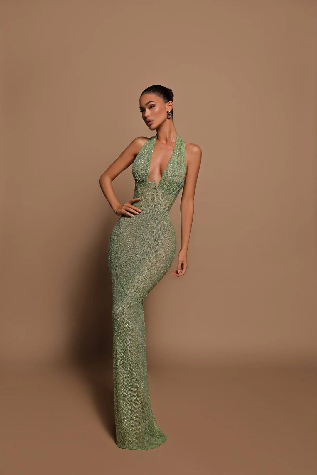 Stylish open-back halter maxi dress for women, ideal as an evening gown or special occasion outfit.