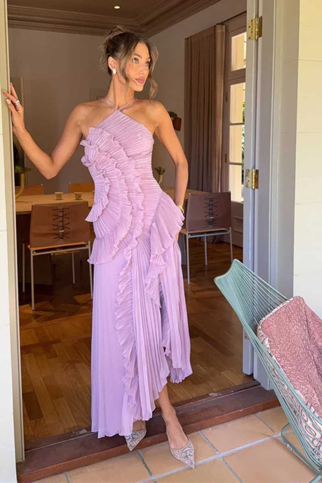 Flowing women's summer maxi dress, backless halter with charming ruffles. Perfect for garden parties or formal events.