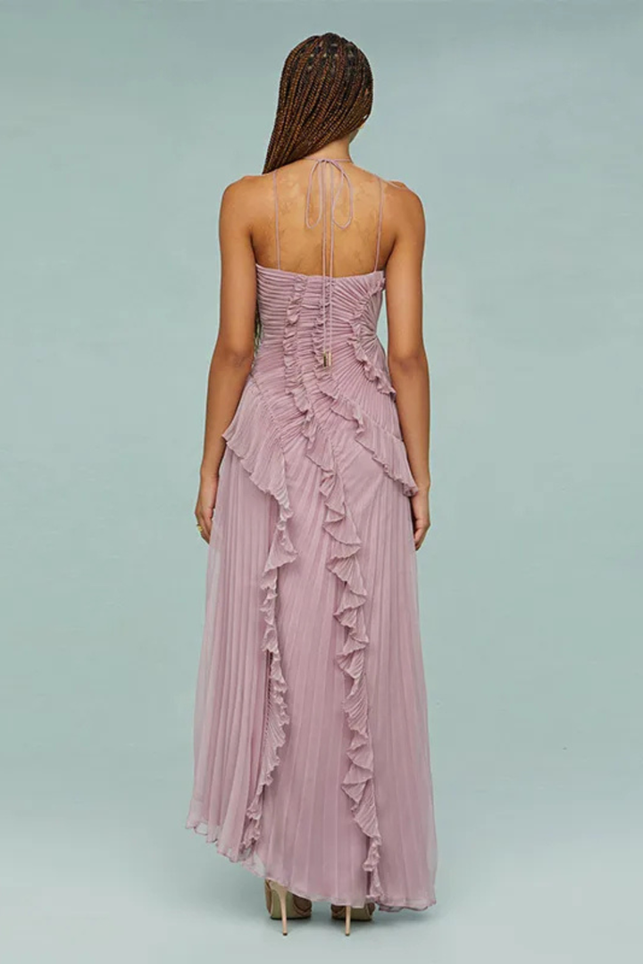 Fashionable women's halter maxi dress, featuring ruffled back & elegant pleats. Perfect for summer events.