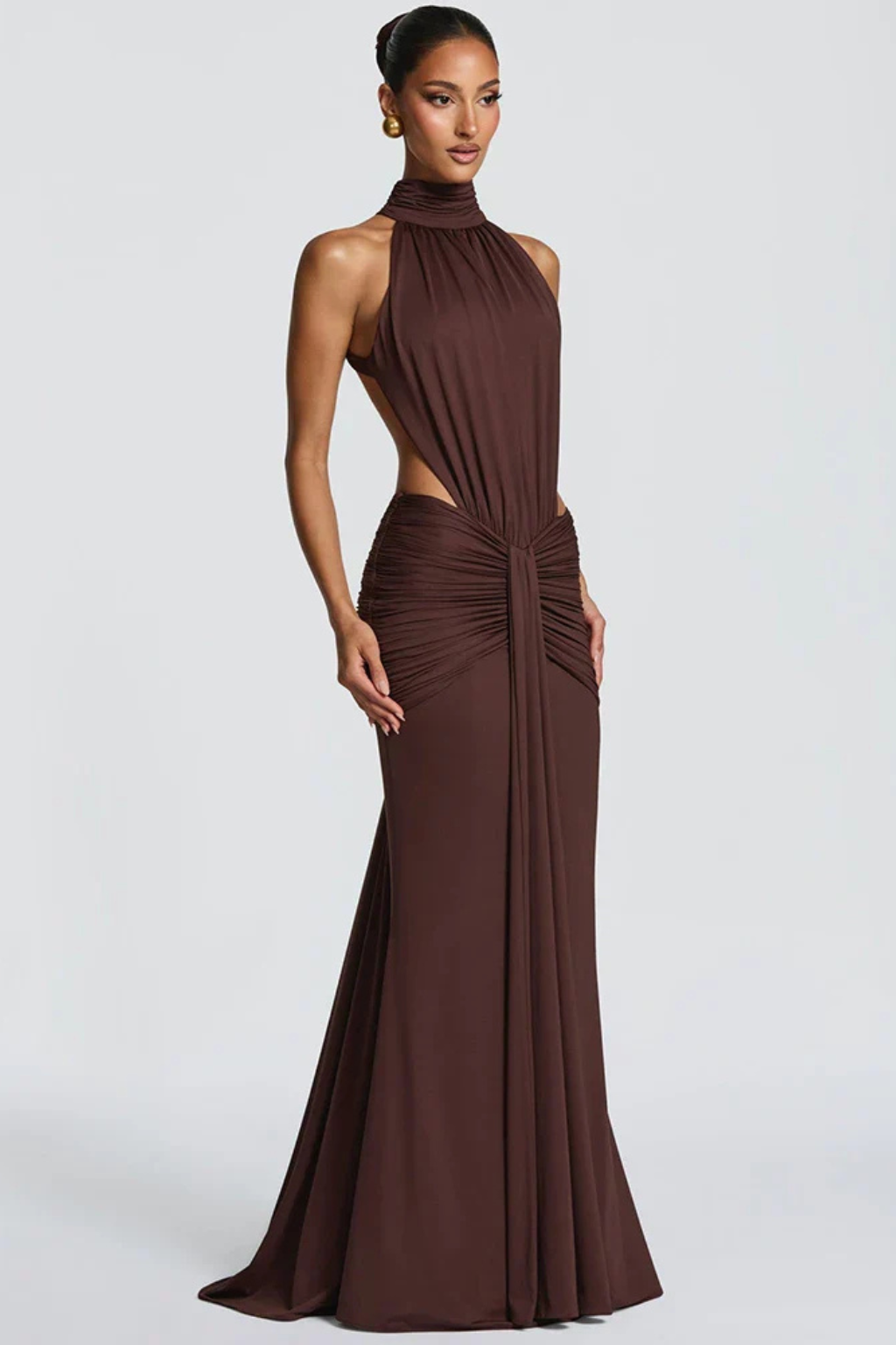 Chic ruched bodycon maxi dress for women, with a sophisticated halter neck and alluring backless silhouette.