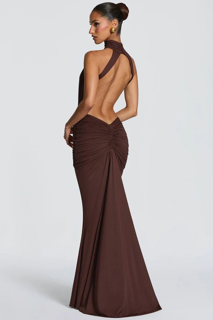 Sleek women's evening halter dress, ruched for a flattering bodycon fit. Ideal as a formal or cocktail maxi dress.