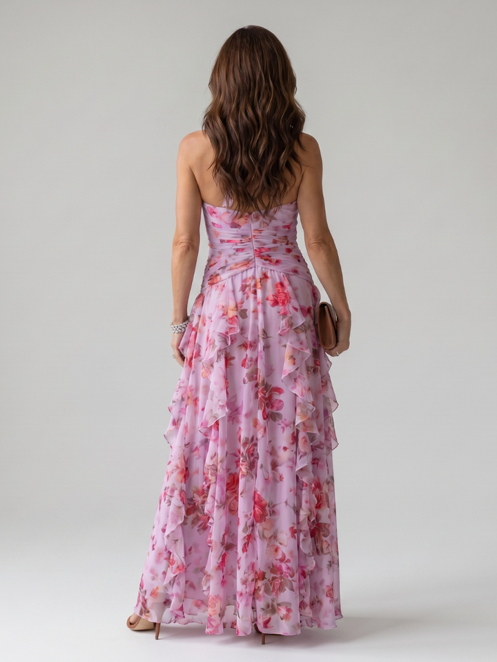 Pink floral halter neck maxi dress for women, an elegant and flowy summer occasion dress.