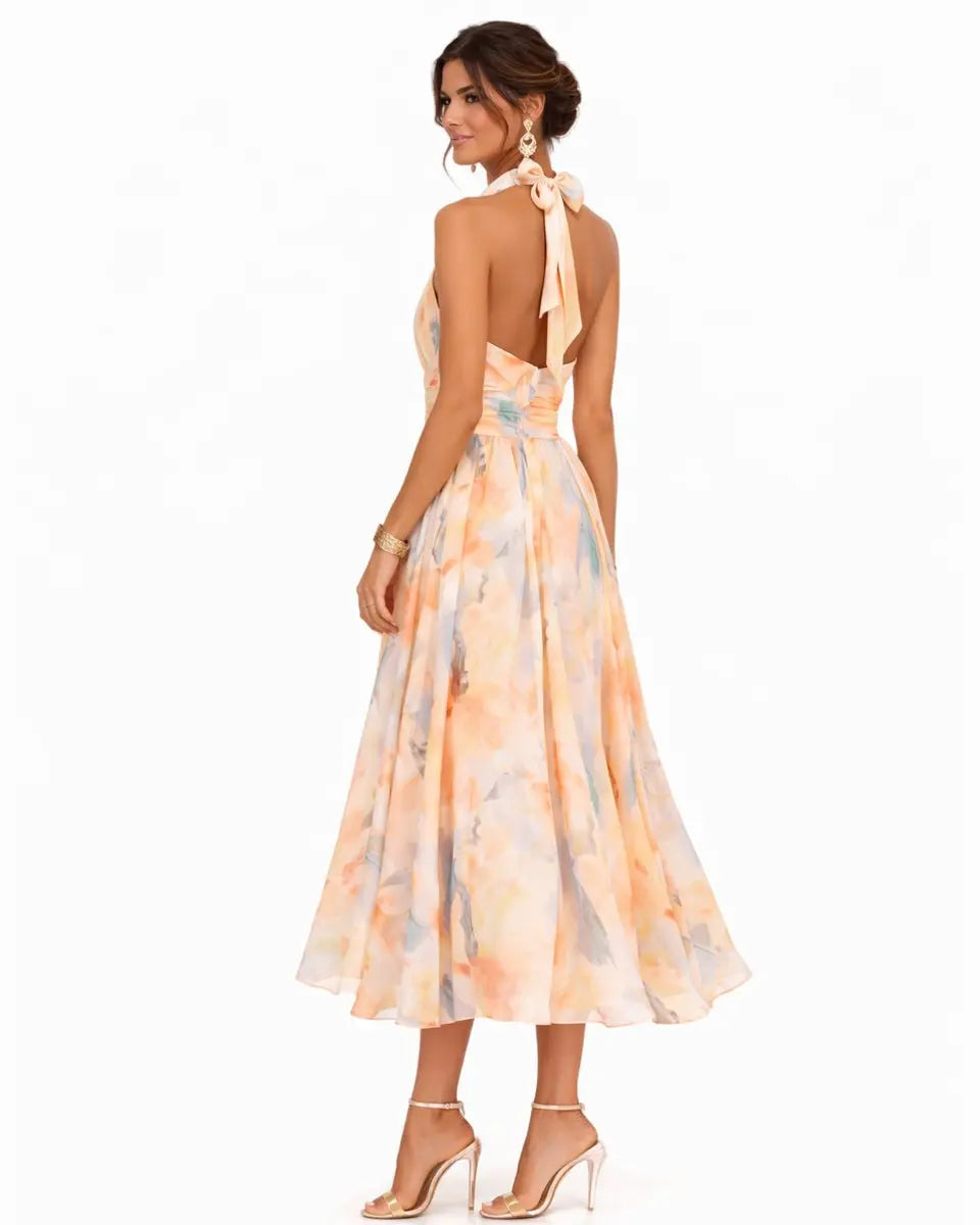 Beautiful women's floral midi dress, a stylish halter neck design for elegant summer and party wear.