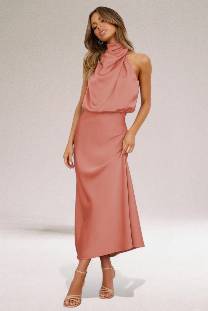 Draped long maxi dress with halter neck for women. Offers elegant style & comfortable fit for formal or casual wear.