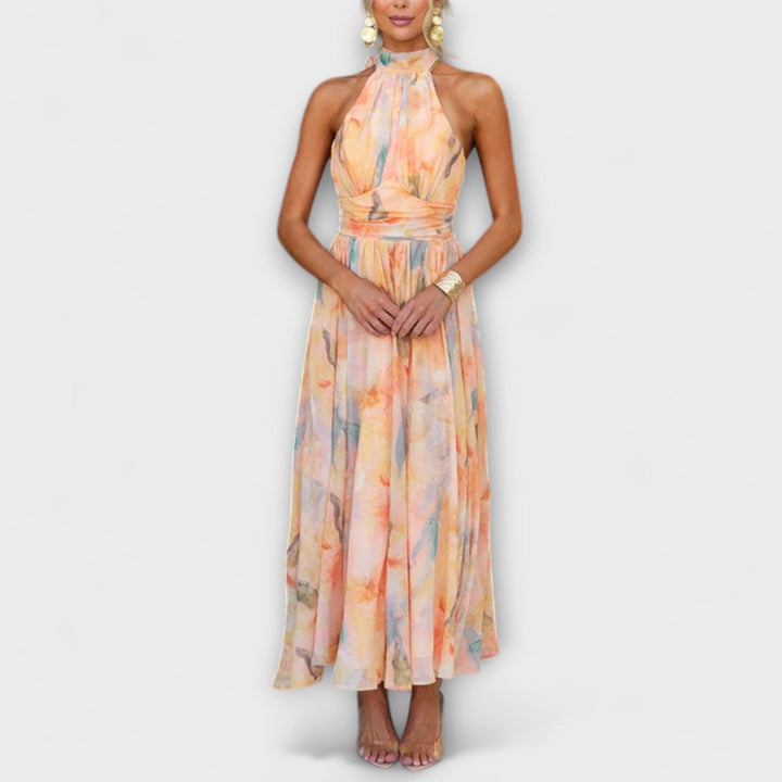 Elegant women's halter neck maxi dress with a sophisticated reddish-orange gradient, perfect for evening wear.