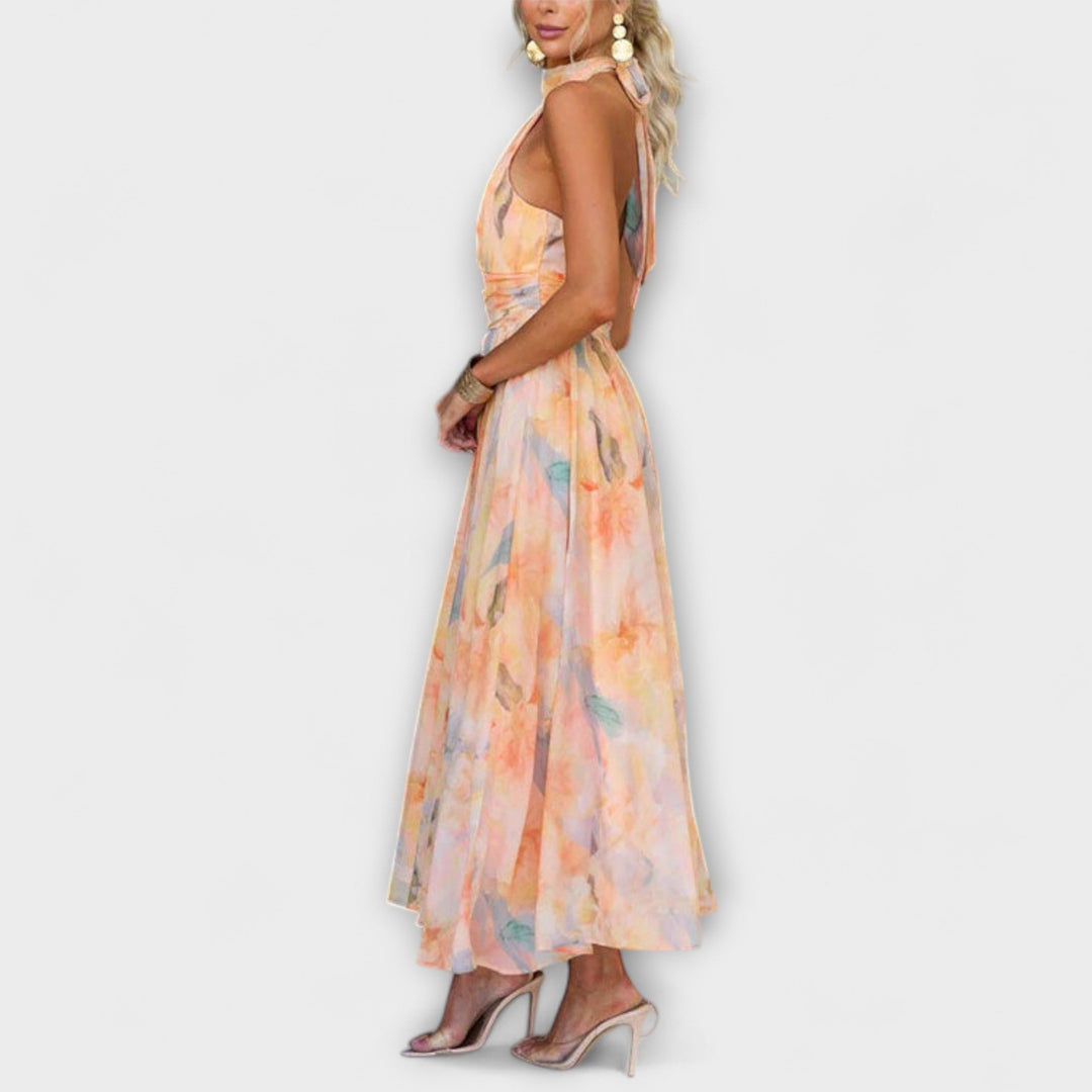 Women's elegant halter neck maxi dress with a unique gradient color, comfortable and stylish for evening events.