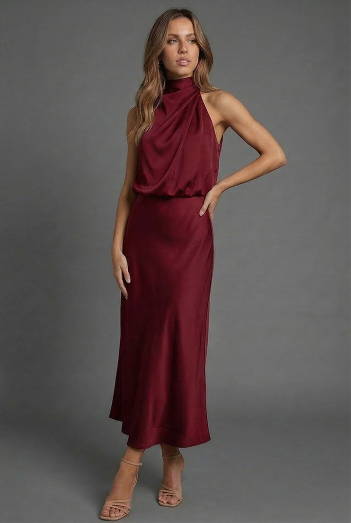 Women's party-ready halter neck midi dress, perfect for elegant summer events & occasions.
