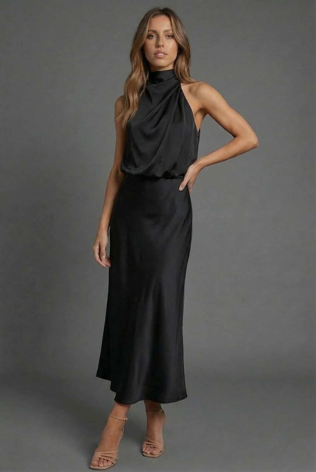 Formal women's midi dress featuring a flattering halter neck and elegant design for events.