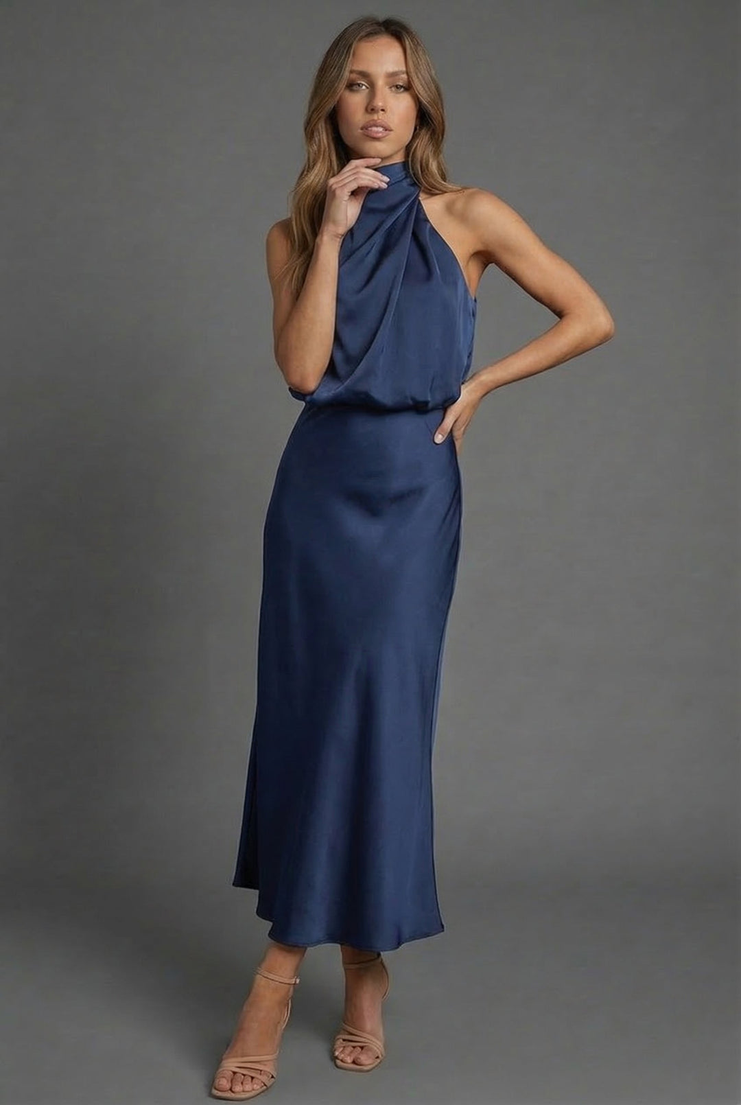 Beautiful women's occasion midi dress with a chic halter neckline & open back detail.