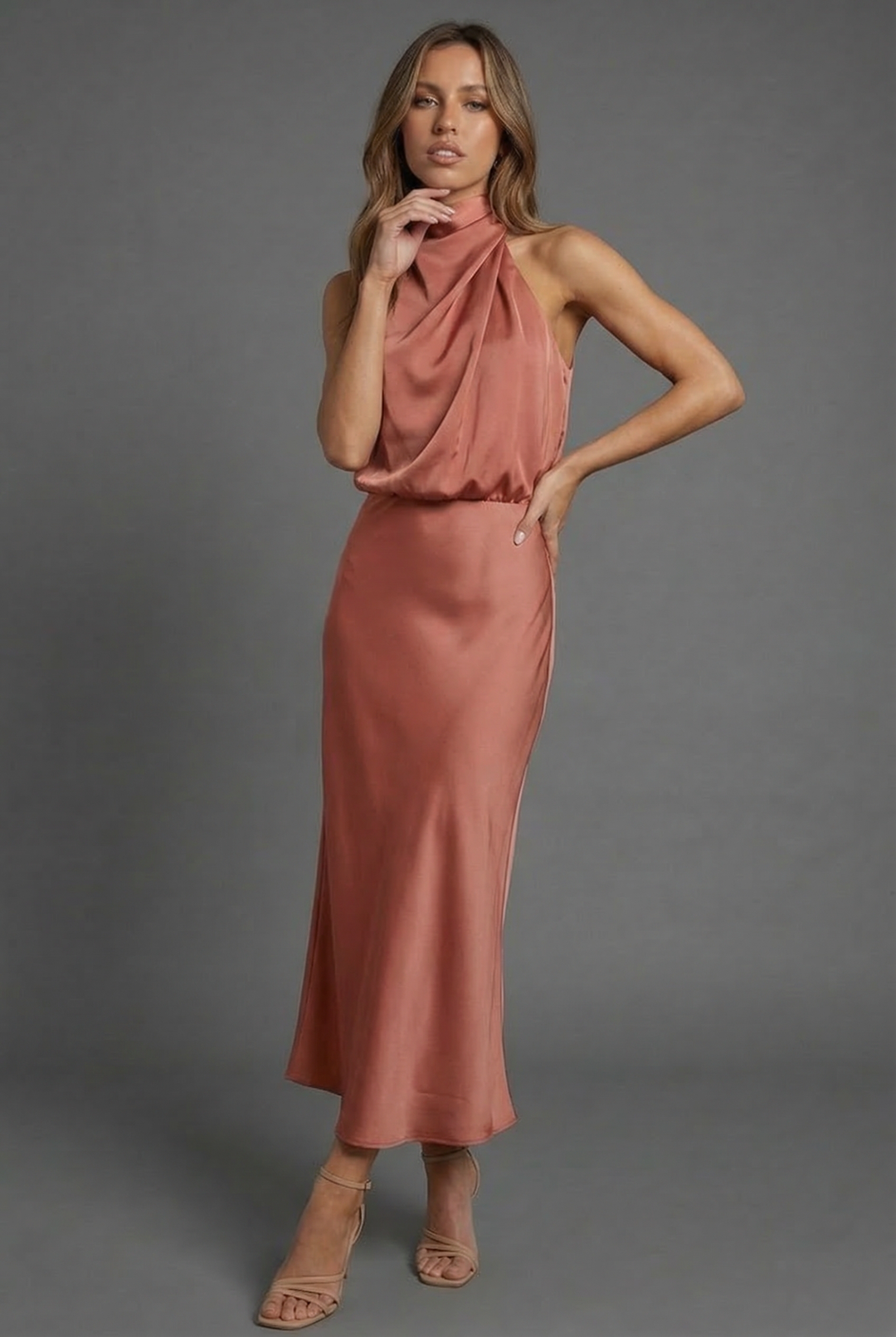 Stylish women's summer midi dress, a halter neck design for wedding guests & formal wear.