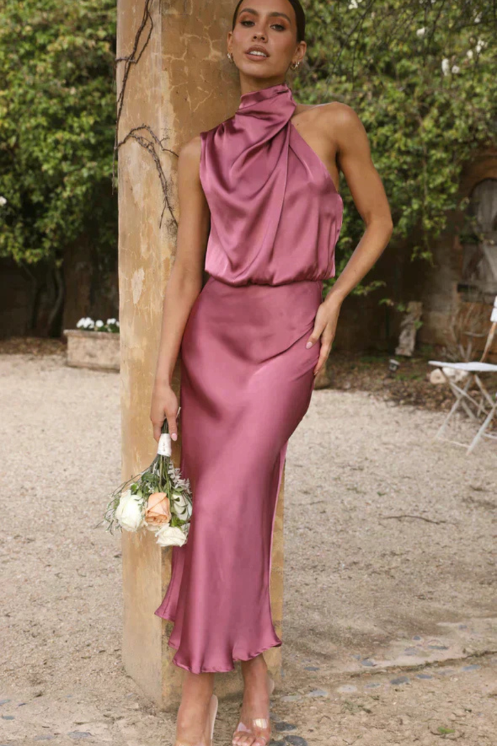 Flattering formal midi dress in a sophisticated design, perfect for special occasions.