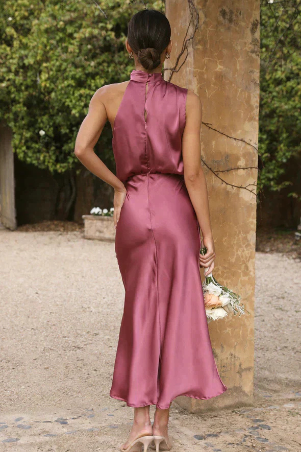 Modern halter neck midi dress for women, ideal for formal parties and evening wear.
