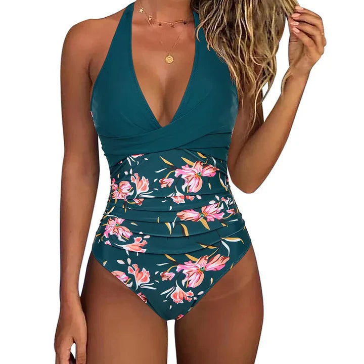 Elegant women's halter neck one-piece swimsuit, perfect for summer beachwear & poolside fashion.