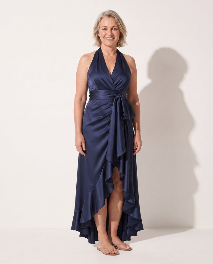 Elegant women's halter neck ruffle maxi dress for formal occasions & evening parties. Black tie ready long gown.