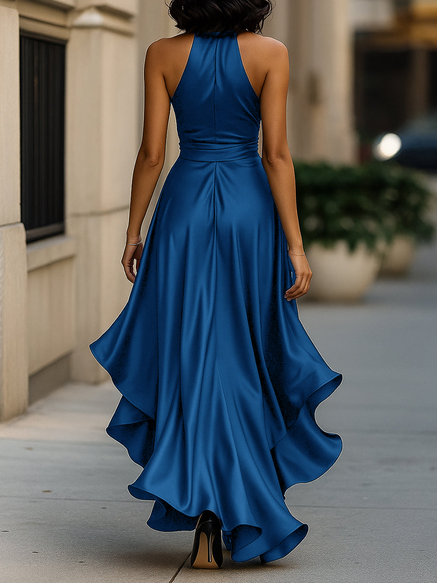 Full-length view of the women's elegant halter ruffle evening gown with high-low hem.