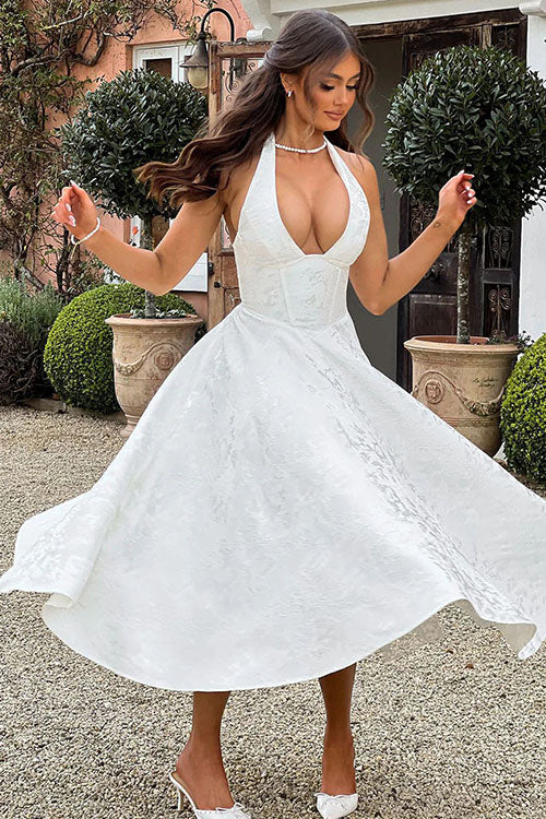 Elegant women's fashion: jacquard maxi dress with a stunning halter V-neck.