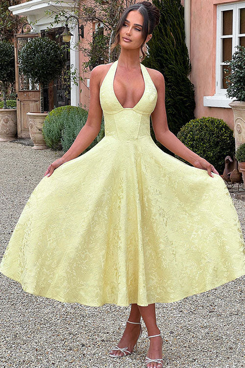 Women's formal wear: elegant jacquard maxi dress with a chic halter V-neck.