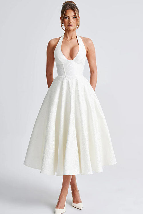 Women's summer fashion: elegant jacquard maxi dress with a stylish halter V-neck.