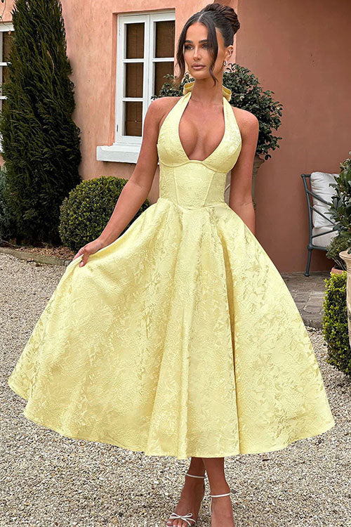 Stylish sleeveless halter V-neck maxi dress in elegant jacquard for women's fashion.
