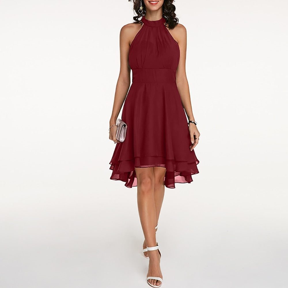 Elegant women's halterneck A-line cocktail dress. Knee-length design with a flattering ruffled hem for evening parties.