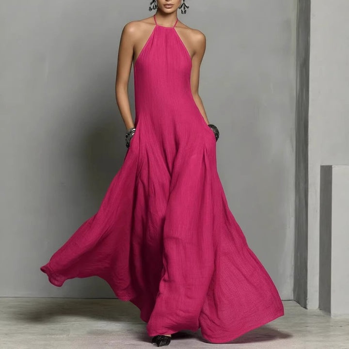 Women's elegant halterneck maxi dress, a chic sleeveless summer dress with flowy design.