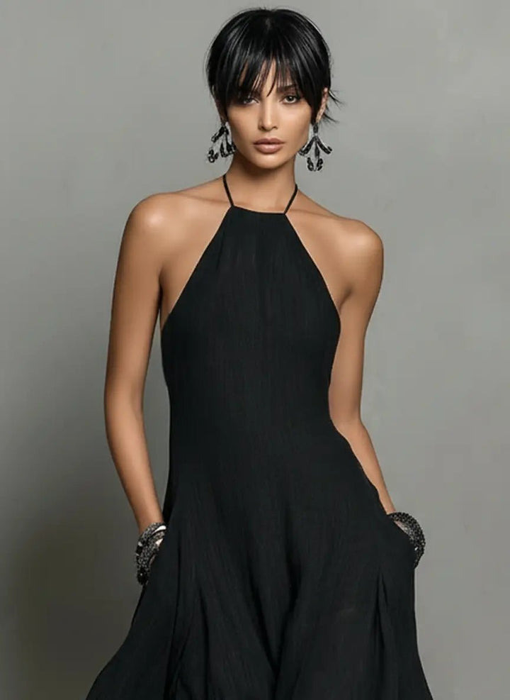Women's halterneck maxi dress, an elegant sleeveless summer dress for casual chic or parties.