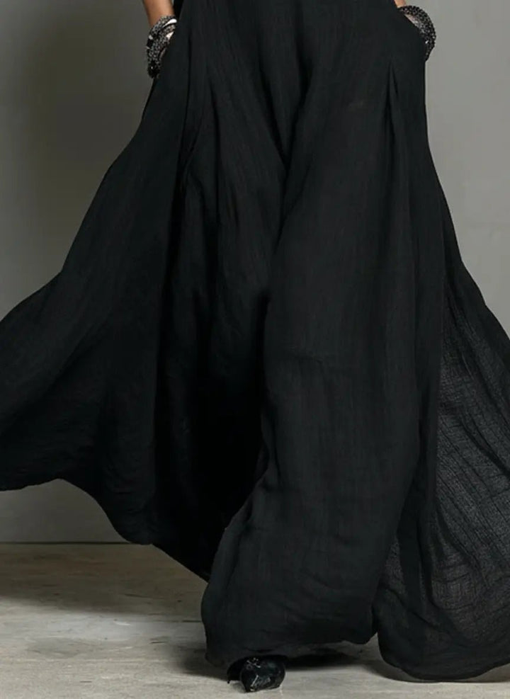 Elegant women's long halterneck summer dress, perfect for evening events or chic vacation wear.