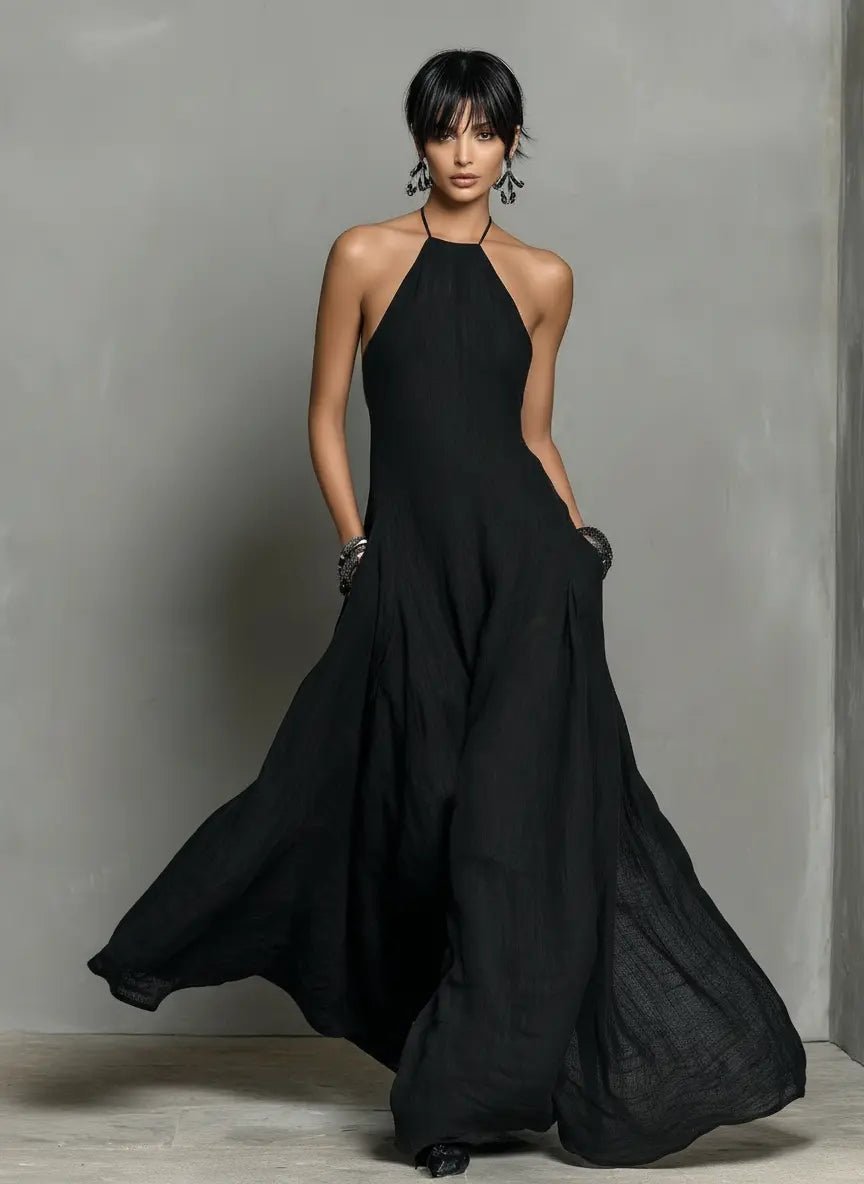 Flowy halterneck maxi dress, stylish women's summer beach dress & elegant vacation essential.