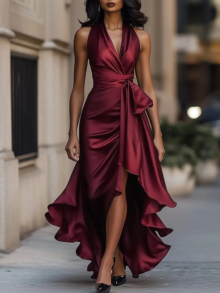 Flowy elegant women's halterneck maxi dress; perfect as a formal evening gown or party dress.