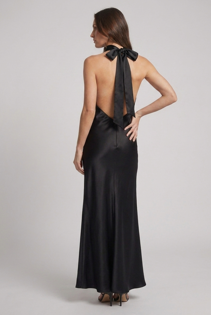 Luxurious women's halterneck maxi dress, a stunning wedding guest or black-tie option for elegant events.