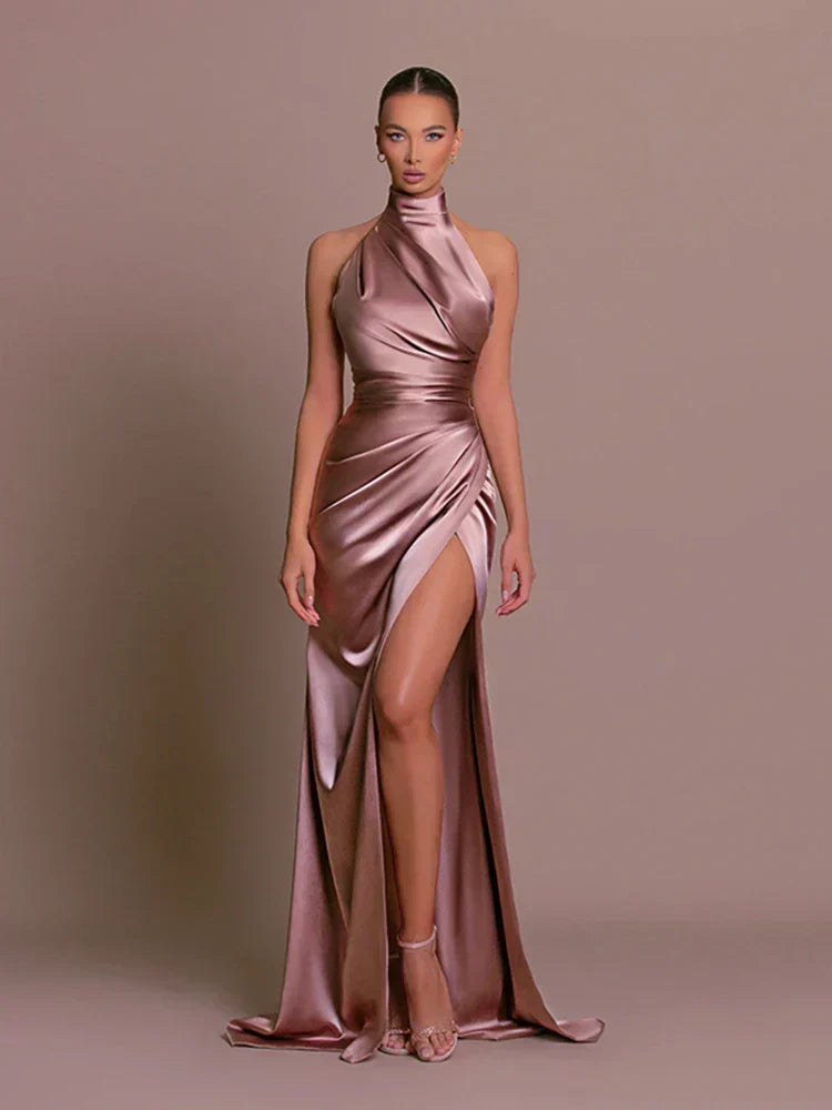 Elegant women's halterneck maxi dress with a high split, perfect for formal evening events and galas.