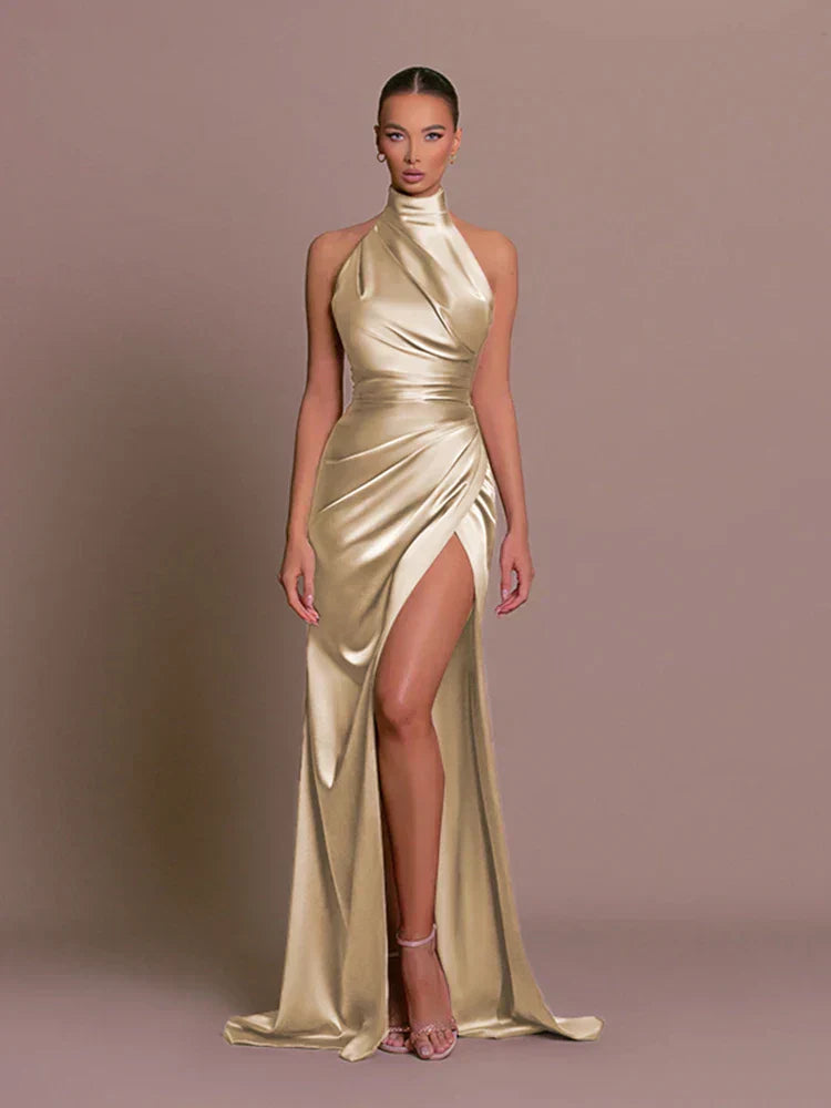 Beautiful women's party dress: elegant halterneck maxi with a graceful high split, perfect for celebrations.