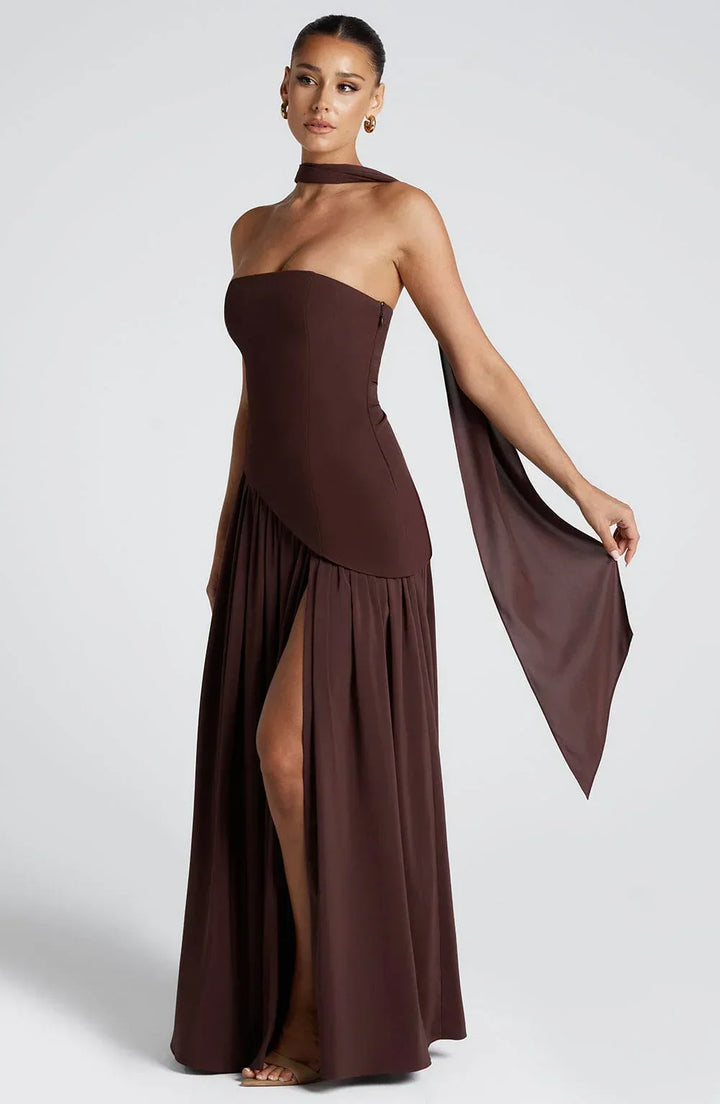 Chic halterneck maxi dress for wedding guests, featuring an elegant high split design.