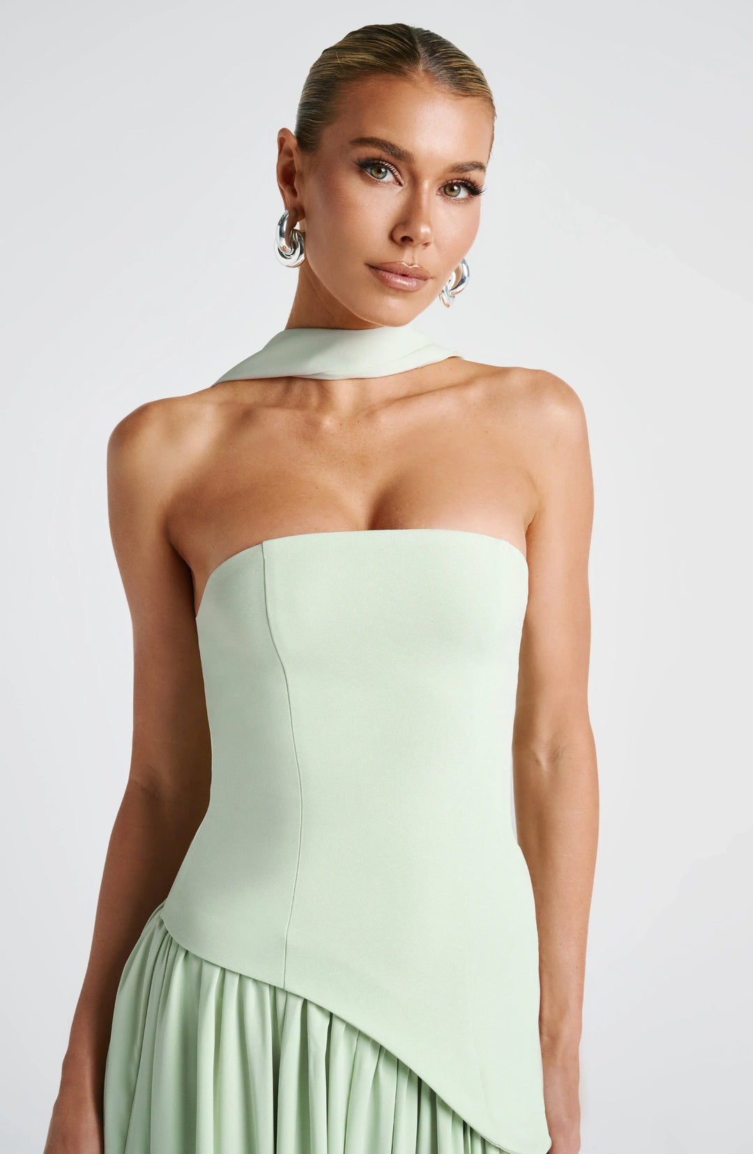 Achieve a glamorous look with this halterneck maxi dress, high split ideal for special occasions.