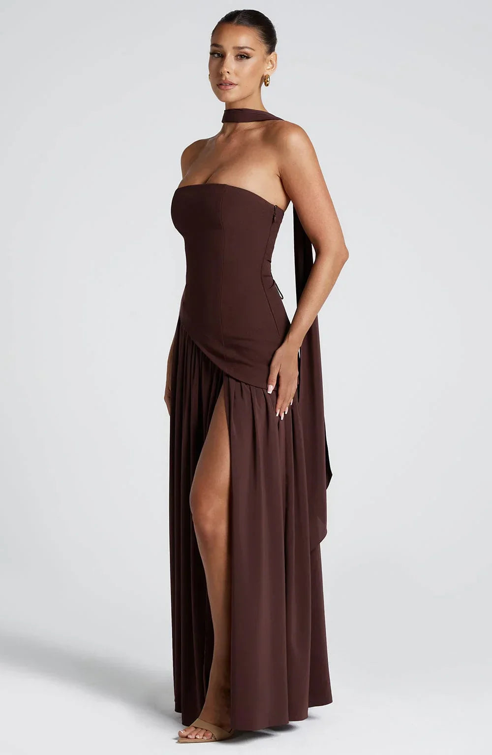 Luxurious elegant halterneck maxi dress with high split, suited for gala, evening, or formal wear.