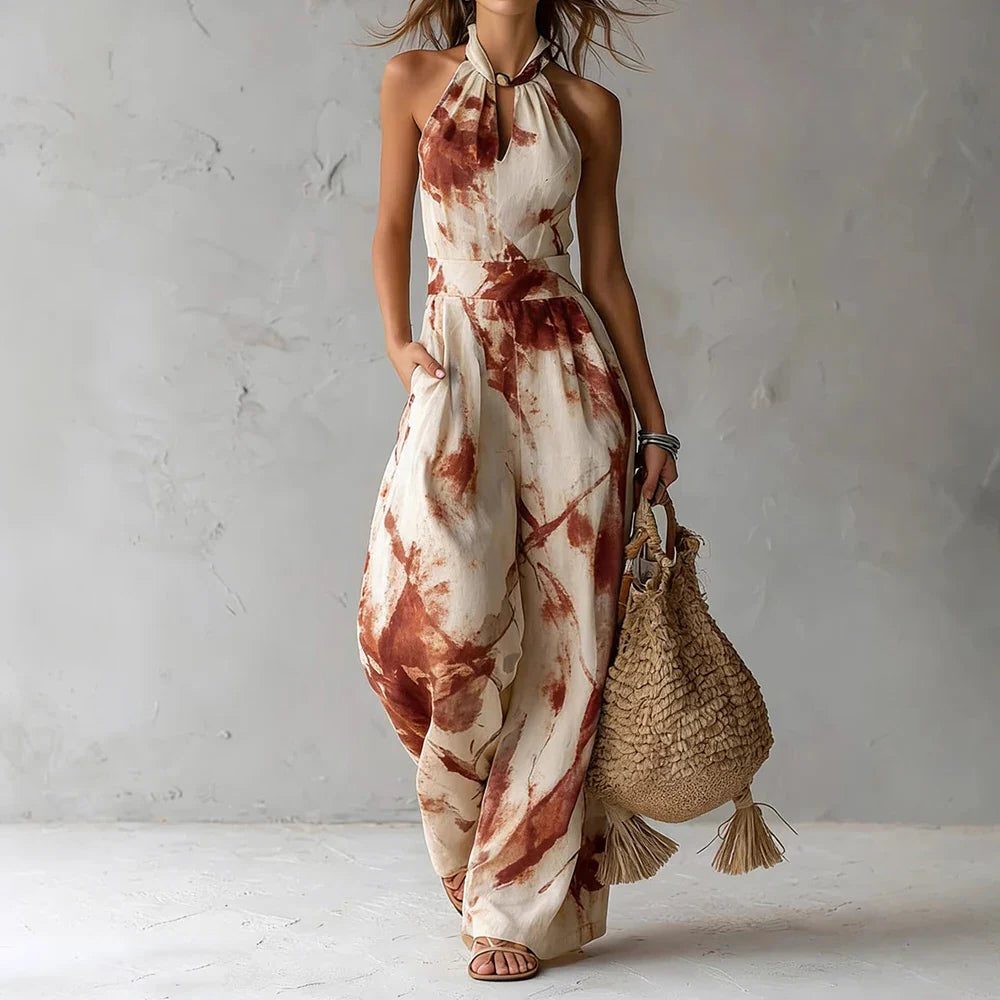 Fashionable women's elegant halterneck wide leg jumpsuit. Flowing and comfortable for summer, party, or vacation.