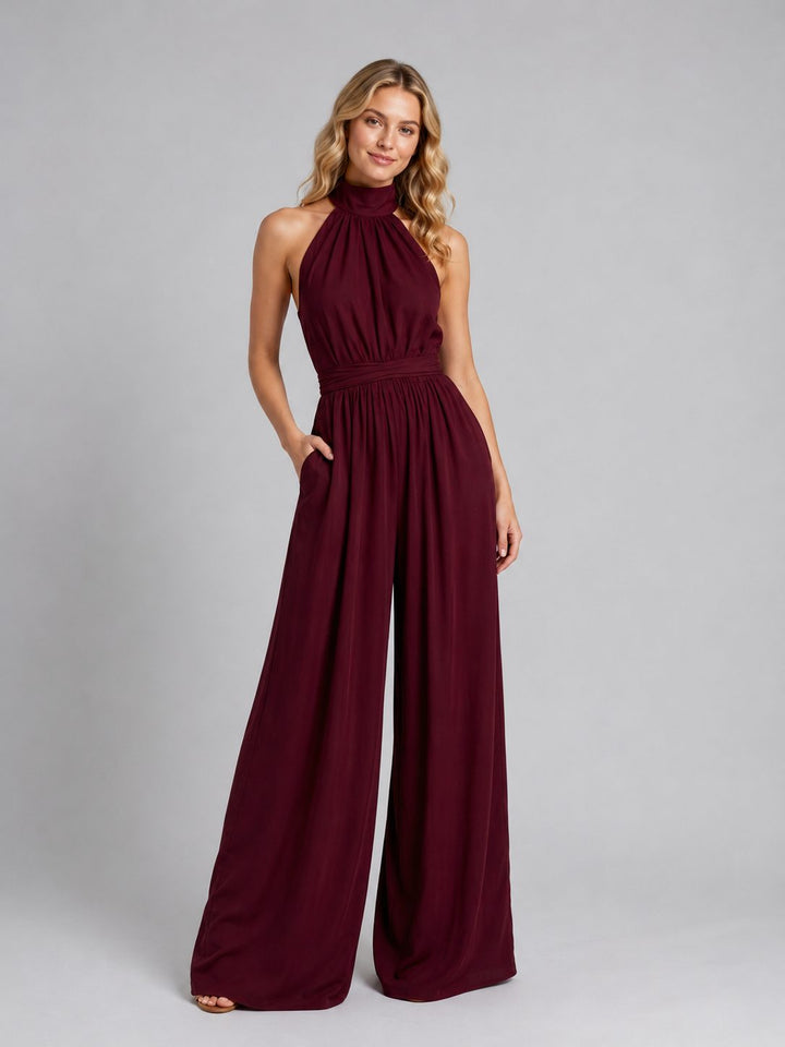 Stylish women's halter neck wide leg jumpsuit, a chic sleeveless piece for any fashion-forward look.