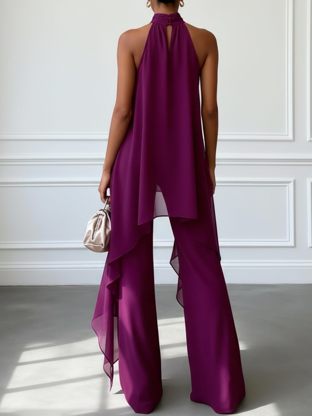 Women's purple wide leg trouser set, featuring a flattering halterneck top, ideal for special events.