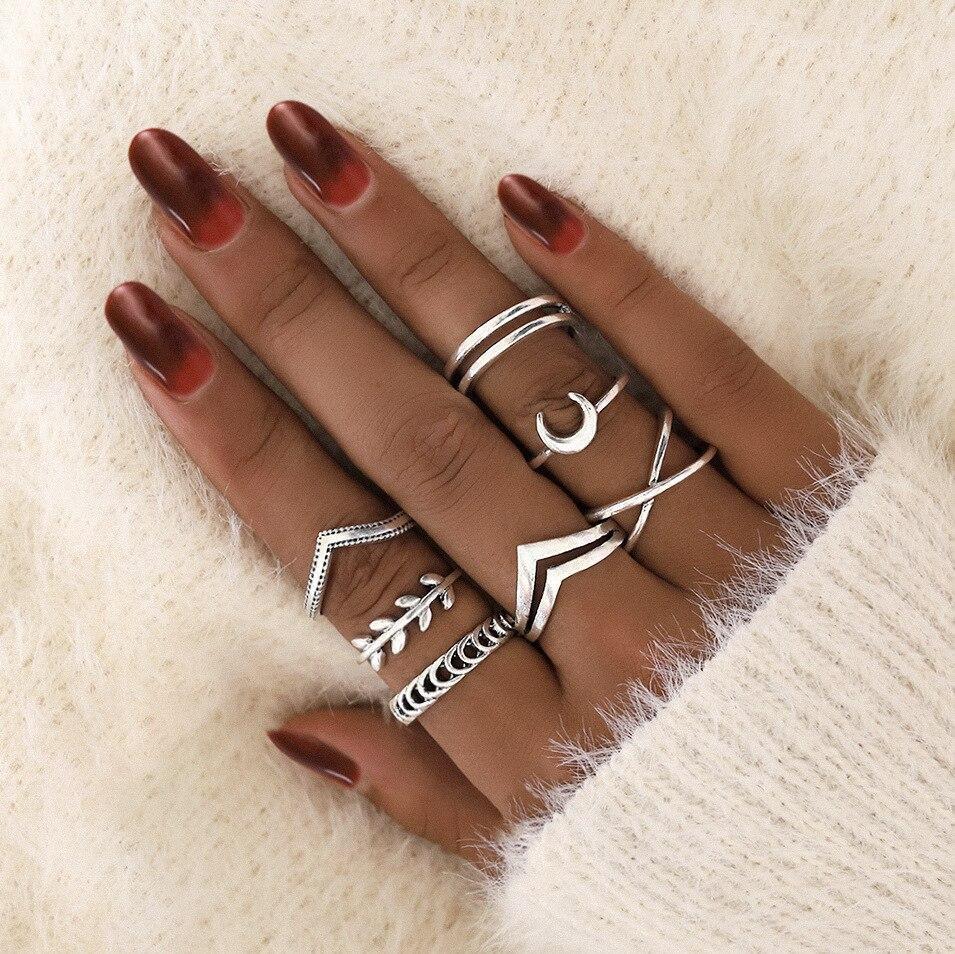 Multiple elegant handmade silver rings from the stackable set, showcasing individual beauty.