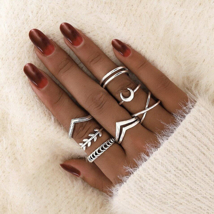 Multiple elegant handmade silver rings from the stackable set, showcasing individual beauty.