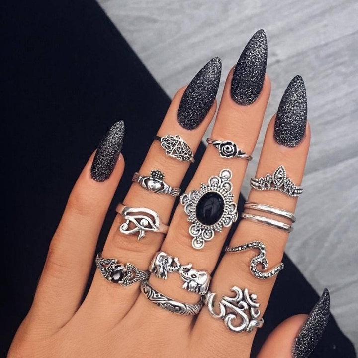 Artisan crafted women's silver ring set, stackable and elegant, celebrating handmade jewelry artistry.