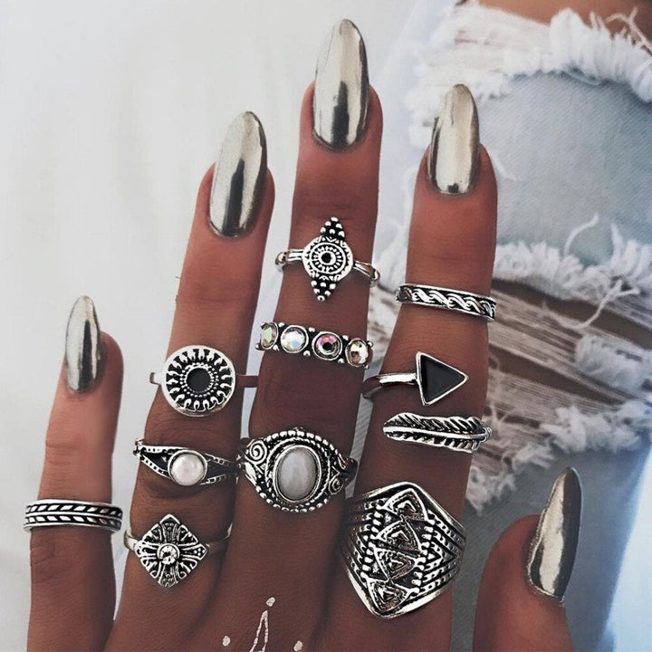 Modern elegant silver ring set for women, handmade stackable bands, contemporary unique design.